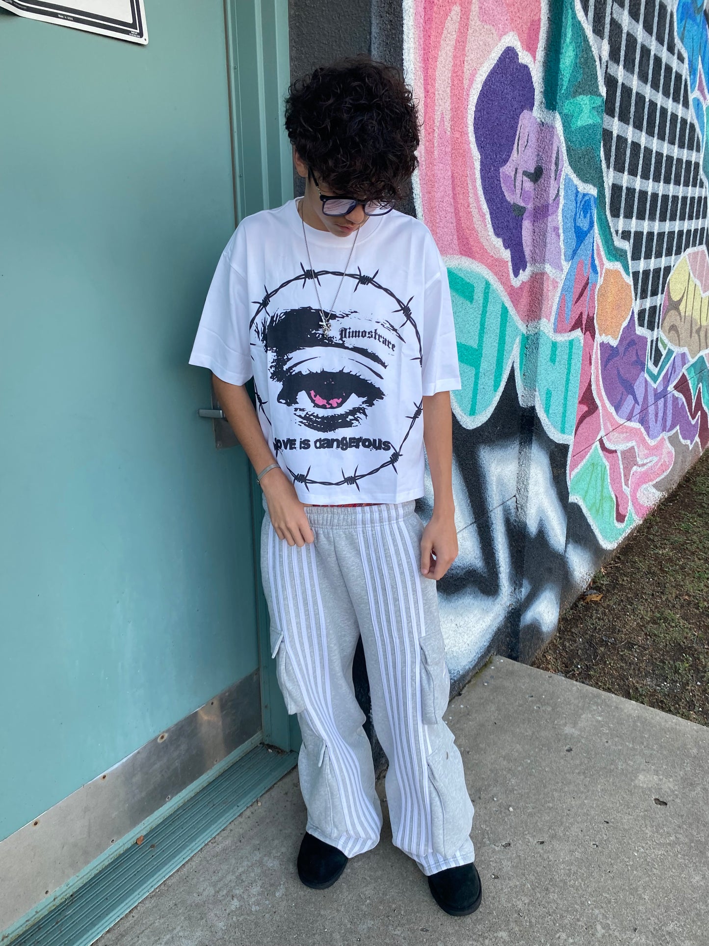 "LOVE IS DANGEROUS T SHIRT"